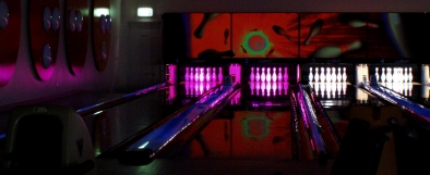 Lanes 1 and 2 with pin deck illuminated violet